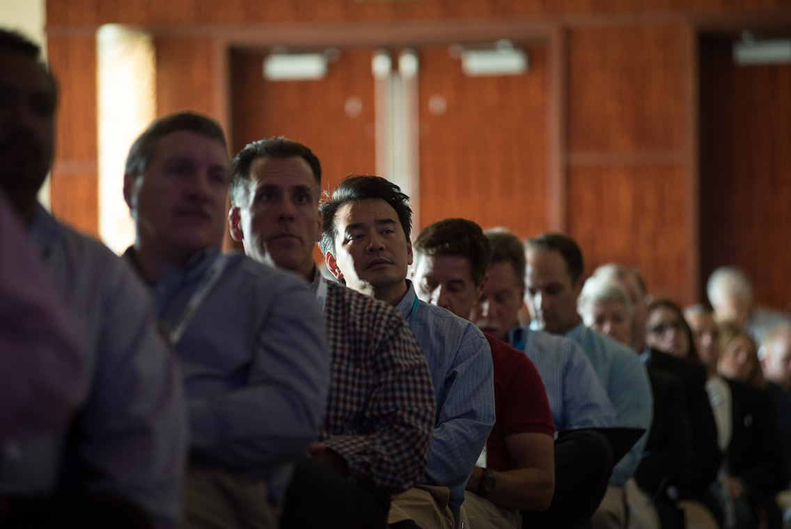 woman smiling at conference