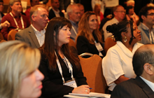 Scope Out a Solution Woman in Audience Listening to Speaker