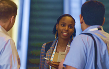 Woman interacting with peers at the 2014 NAEM EHS Management Forum