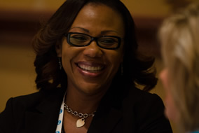 african american woman attendee smiling